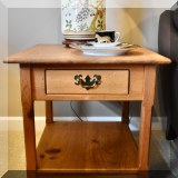 F25. Pine side table with one drawer. 22”h x 22”w x 24”d 